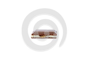 Milk chocolate with milk filling and caramel isolated on white background.