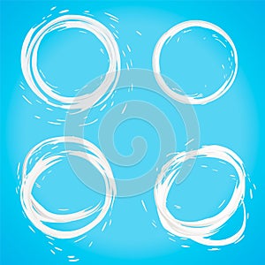 Milk circle splash on blue background. round white cream liquid or yogurt blots set with droplet, drops. top view. 3d