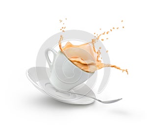Milk coffee splash in white cup