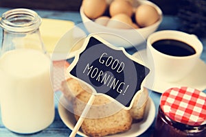 Milk, coffee and toasts and the text good morning photo