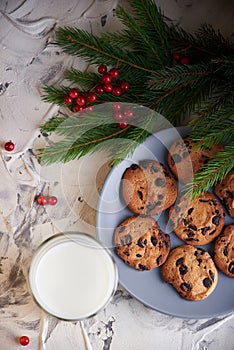 milk and cookies for Santa. holidays, celebration and home concept