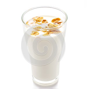 Milk and cornflake on white background