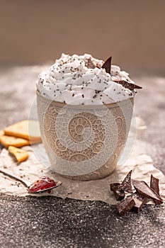 Milk cream mousse decorated with chocolate and Chia seeds