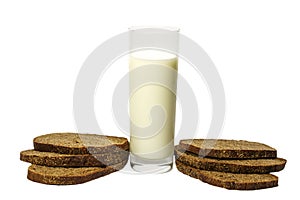 Milk in a glass fresh paired with sliced ??rye bread. Isolated on white background.
