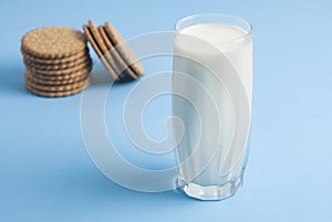 Milk in Glass Isolated with Biscuits Cookies Blue Background Dairy Products Lactose