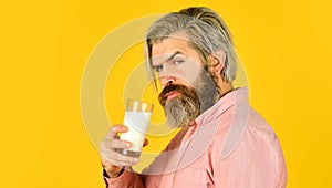 Milk for good health. Lactose free. Bearded man hold glass of milk. Vegan milk concept. Drink protein cocktail. Healthy