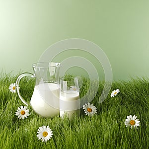 Milk in jar and glass on flower meadow