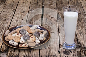 milk, a plate of assorted cakes
