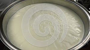 Milk is poured into a pasteurizer