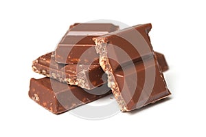 Milk puffed rice chocolate blocks on white background