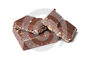 Milk puffed rice chocolate blocks on white background