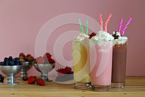 Milk shakes with strawberries vanilla and chocolate