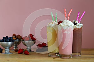 Milk shakes with strawberries vanilla and chocolate photo