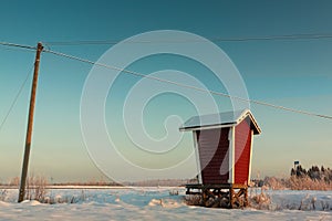 Milk Shelter And A Telephone Pole