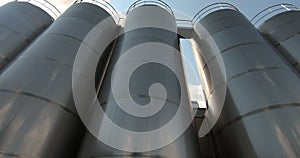 A milk storage tank at a dairy plant. Milk tanks in the unloading area.