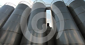 A milk storage tank at a dairy plant. Milk tanks in the unloading area.