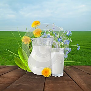 Milk and sunny spring field