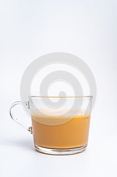 Milk tea or popularly known as The Tarik in Malaysia, isolated on the white background center of the frame