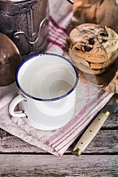 Milk in a vintage can and cookies