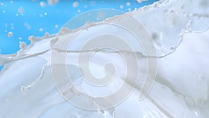 Milk Waves Splashing on Blue Background in Slow Motion at 1500 fps