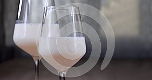 Milk in a wine glass still life stock images