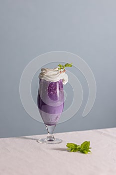 Milkshake with blueberry and blueberry flowers