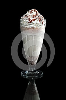 Milkshake caramel summer cocktail isolated on black