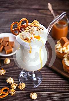 Milkshake with caramel syrup, popcorn and brezel waffles