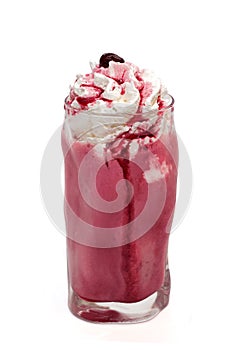 Milkshake with cherry and cream isolated