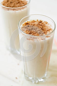 Milkshake with chocolate topping in glass cup