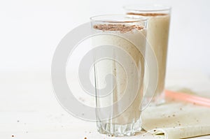 Milkshake with chocolate topping in glass cup