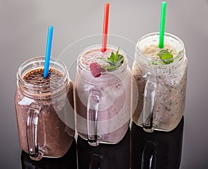 Milkshake in jar with a straw