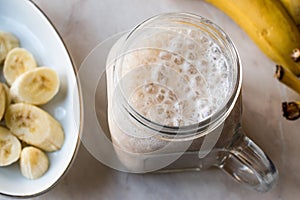 Milky Banana Smoothie in Mason Jar with Milk Milkshake