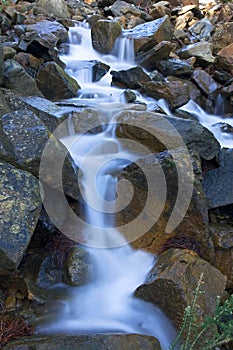 Milky waters of Spanish waterfall after rain