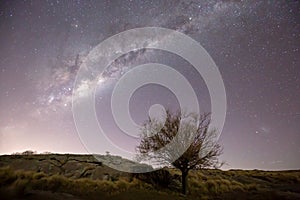 Milky way and bright star night sky across Patagonia