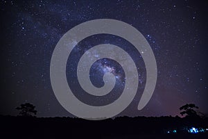 milky way galaxy and silhouette of tree with cloud at Phu Hin Rong Kla National Park,Phitsanulok Thailand