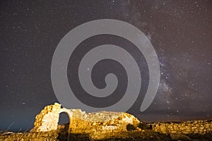 Milky way over the ancien ruin door entrance for a space dimension photo