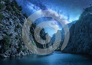 Milky Way over the beautiful mountain canyon and sea at night