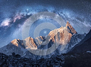 Milky Way over beautiful mountains at night. Space landscape