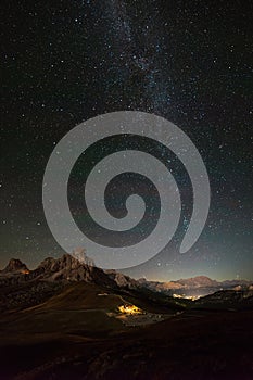 The Milky Way over Cortina from the Giau pass in the dolomites and mount Nuvolau