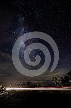 Milky Way over the road at night. Long exposure photograph