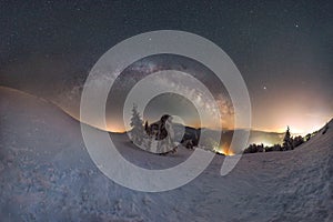 Milky Way over snowy mountain