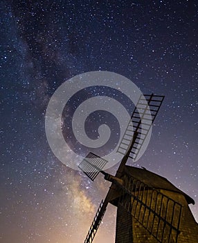 Milky Way rising behind historic windmill