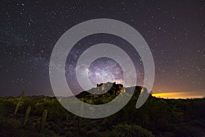 The Milky Way and starry night sky over the Superstition Mountains