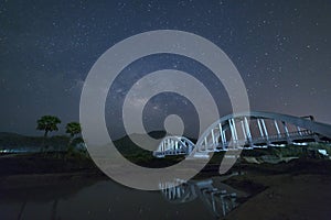 Milky Way and Starry night sky on the white Bridge landscape