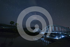 Milky Way and Starry night sky on the white Bridge landscape