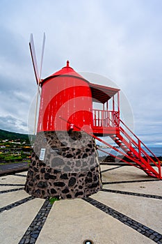 mill on Avenida do Mar, red with strong colors in the parish of SÃ£o Roque, Pico Island, Azores archipelago.