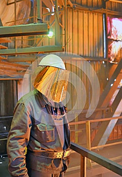 Mill worker with hot steel