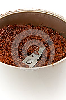 Milled coffee in a grinder photo