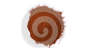 Milled or ground paprika or red pepper heap isolated on white background. top view